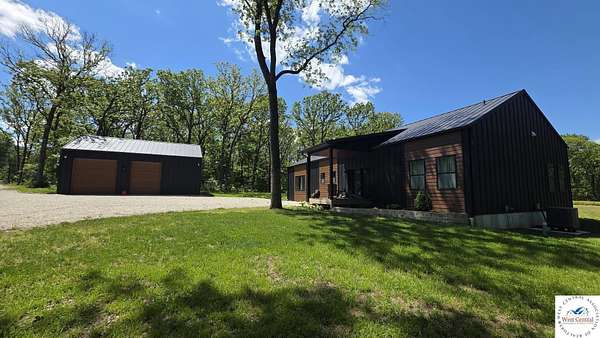 15 Acres of Recreational Land with Home for Sale in Mora, Missouri