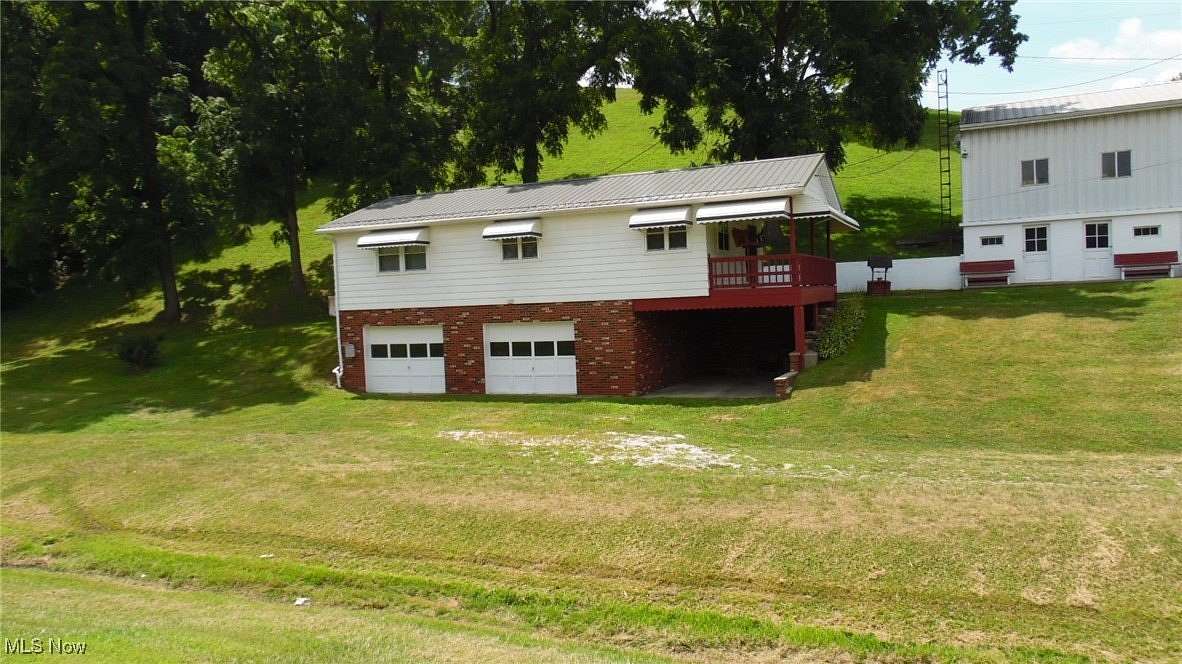 1.8 Acres of Residential Land with Home for Sale in Coshocton, Ohio