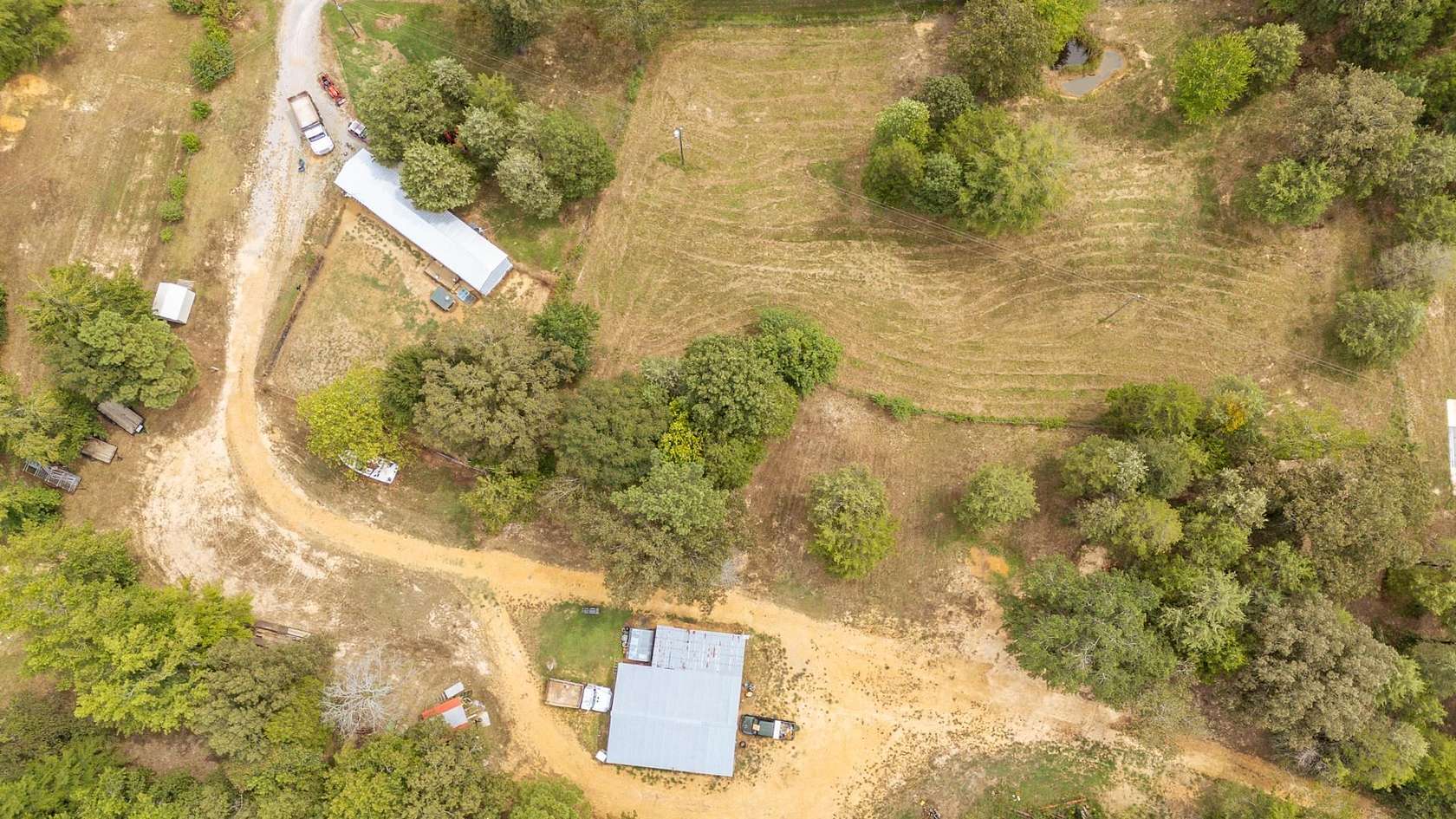 27.5 Acres of Recreational Land with Home for Sale in Crump, Tennessee