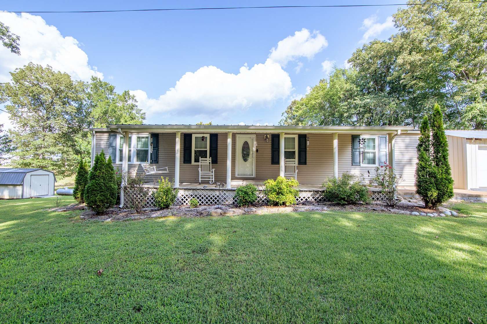 5.38 Acres of Residential Land with Home for Sale in Clifton, Tennessee