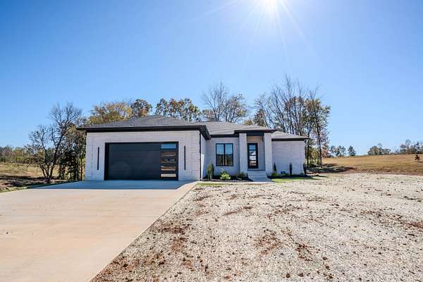 2 Acres of Residential Land with Home for Sale in Loretto, Tennessee