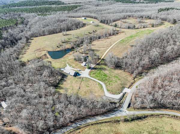 93.8 Acres of Land with Home for Sale in Westpoint, Tennessee