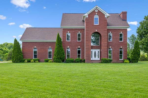 1.54 Acres of Residential Land with Home for Sale in Hohenwald, Tennessee