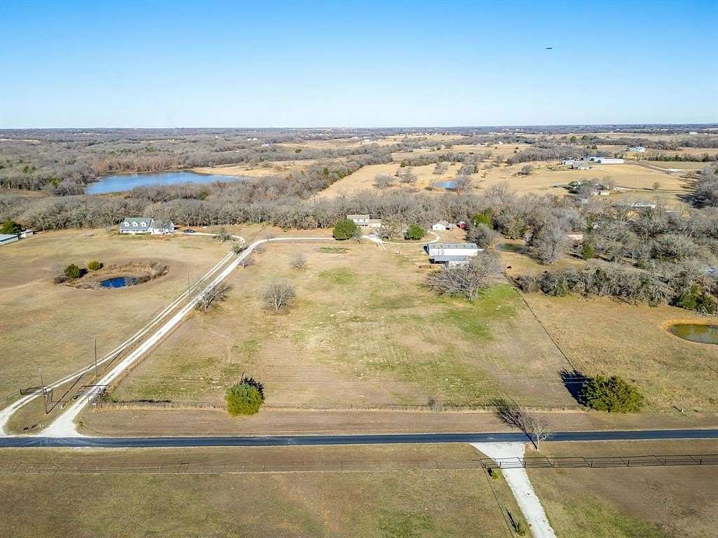 7 Acres of Land with Home for Sale in Grandview, Texas