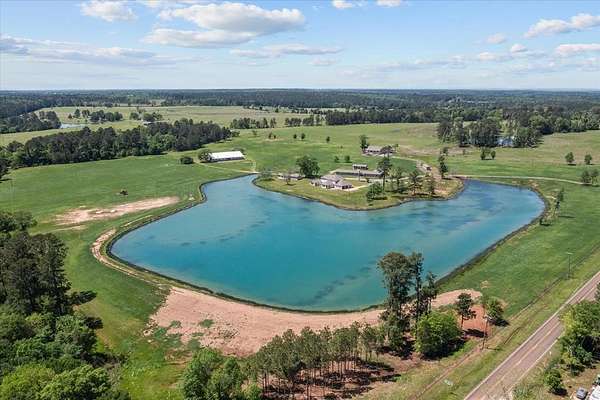 80.7 Acres of Agricultural Land with Home for Sale in Crockett, Texas