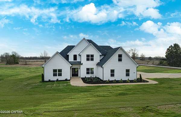 1.69 Acres of Residential Land with Home for Sale in Gadsden, Tennessee