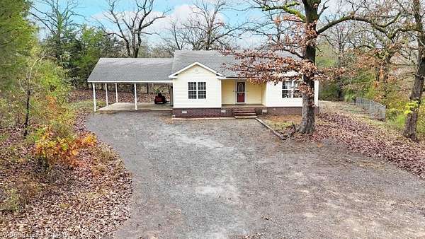 1.55 Acres of Residential Land with Home for Sale in Poteau, Oklahoma