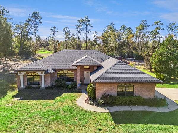 2.62 Acres of Residential Land with Home for Sale in Deltona, Florida