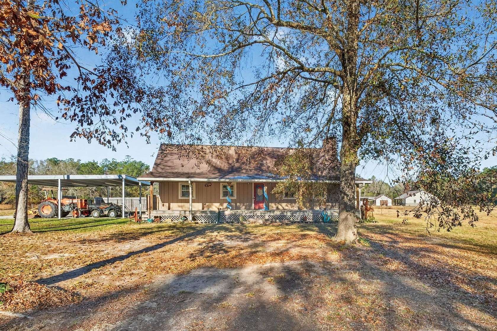 5 Acres of Residential Land with Home for Sale in Kountze, Texas