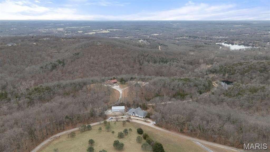 5.53 Acres of Residential Land with Home for Sale in Hillsboro, Missouri