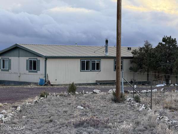 9.87 Acres of Residential Land with Home for Sale in Show Low, Arizona