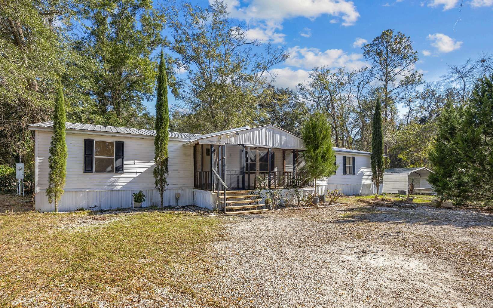 2 Acres of Residential Land with Home for Sale in Lake City, Florida