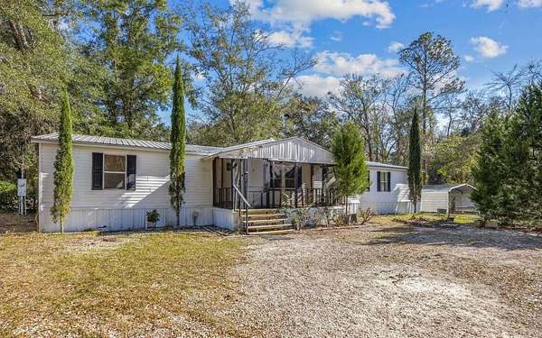 2 Acres of Residential Land with Home for Sale in Lake City, Florida