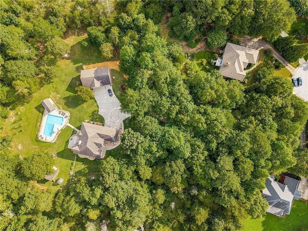 4.63 Acres of Land with Home for Sale in Loganville, Georgia