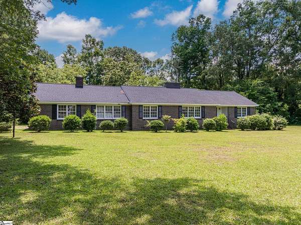 1.5 Acres of Land with Home for Sale in Clinton, South Carolina