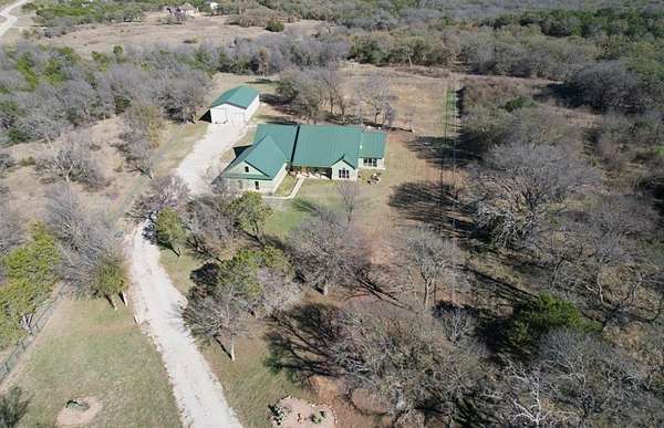 5.18 Acres of Residential Land with Home for Sale in Graford, Texas