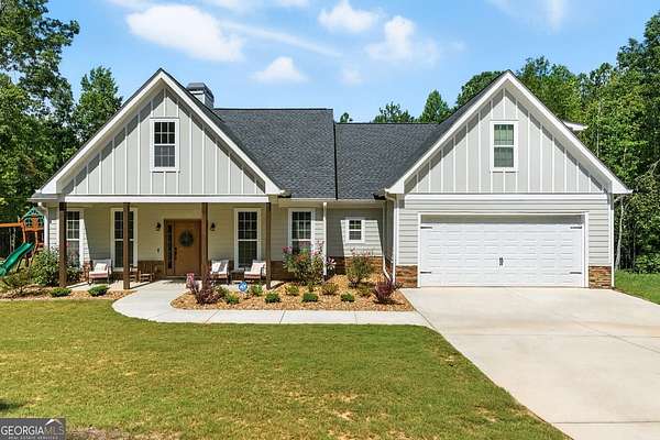 6.6 Acres of Land with Home for Sale in Buchanan, Georgia