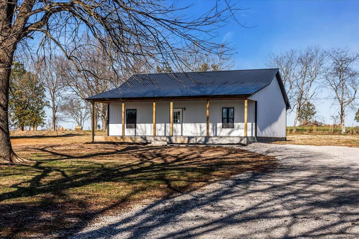 3.4 Acres of Residential Land with Home for Sale in Decherd, Tennessee