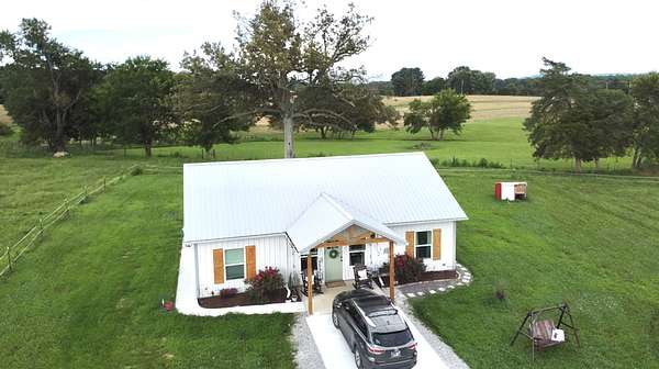 11.7 Acres of Land with Home for Sale in Morrison, Tennessee