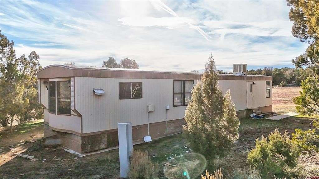 5 Acres of Residential Land with Home for Sale in Cahone, Colorado