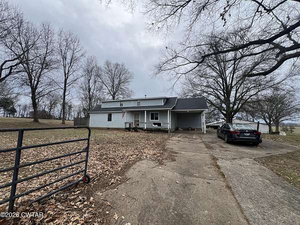 5.7 Acres of Residential Land with Home for Sale in Dyersburg, Tennessee