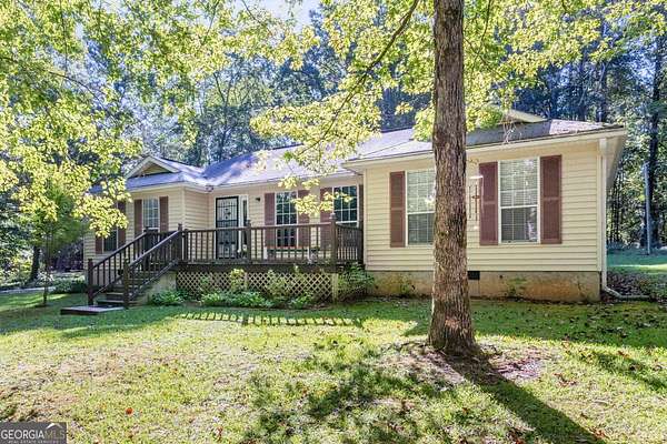 3.87 Acres of Residential Land with Home for Lease in Sharpsburg, Georgia