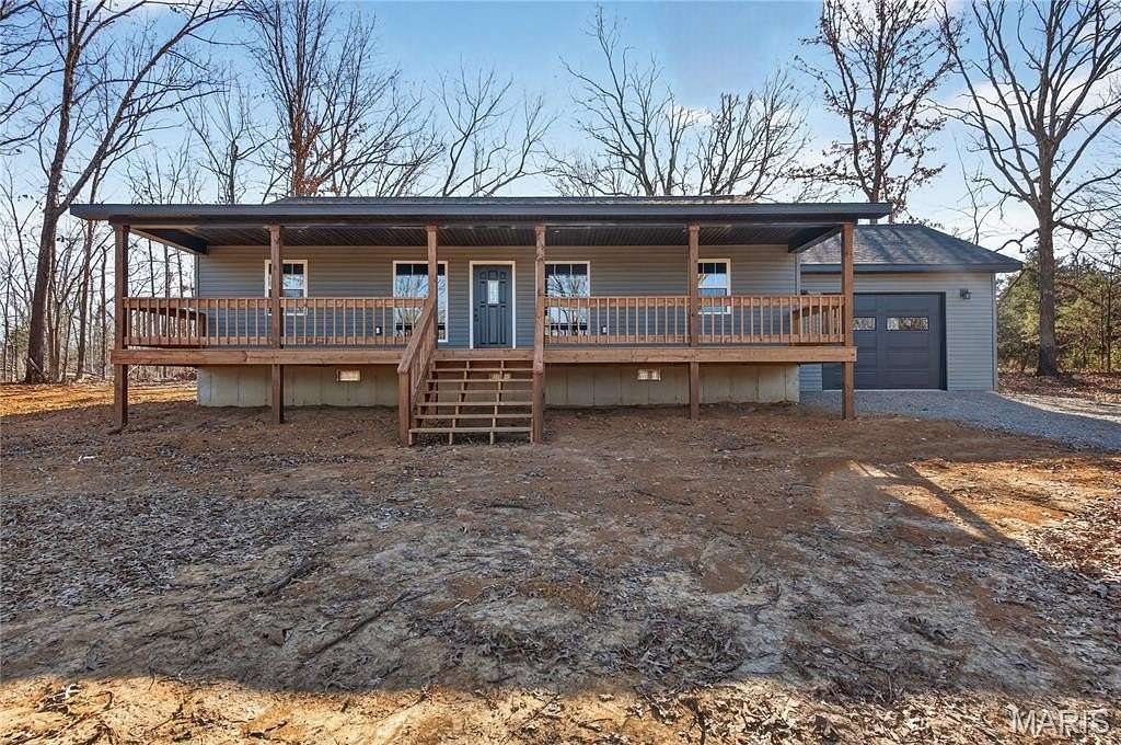 4 Acres of Residential Land with Home for Sale in Fairdealing, Missouri