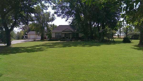 5 Acres of Residential Land with Home for Sale in Yukon, Oklahoma
