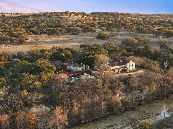 168 Acres of Agricultural Land with Home for Sale in Hunt, Texas
