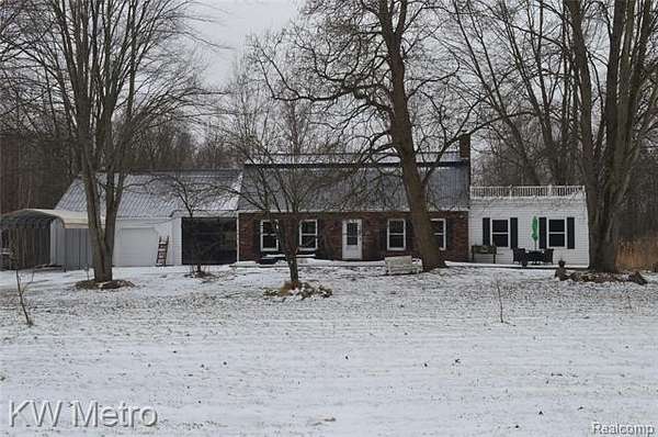 4.13 Acres of Residential Land with Home for Sale in Columbus, Michigan