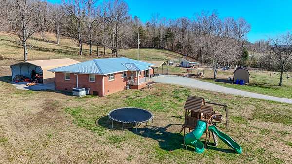 11 Acres of Land with Home for Sale in Collinwood, Tennessee