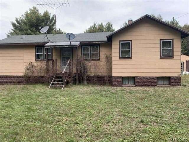 5 Acres of Residential Land with Home for Sale in Idlewild, Michigan