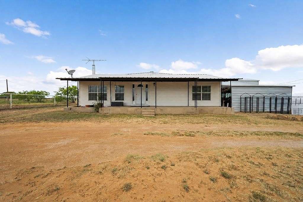 11.2 Acres of Land with Home for Sale in Coahoma, Texas