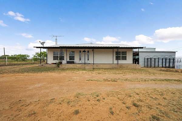 11.2 Acres of Land with Home for Sale in Coahoma, Texas