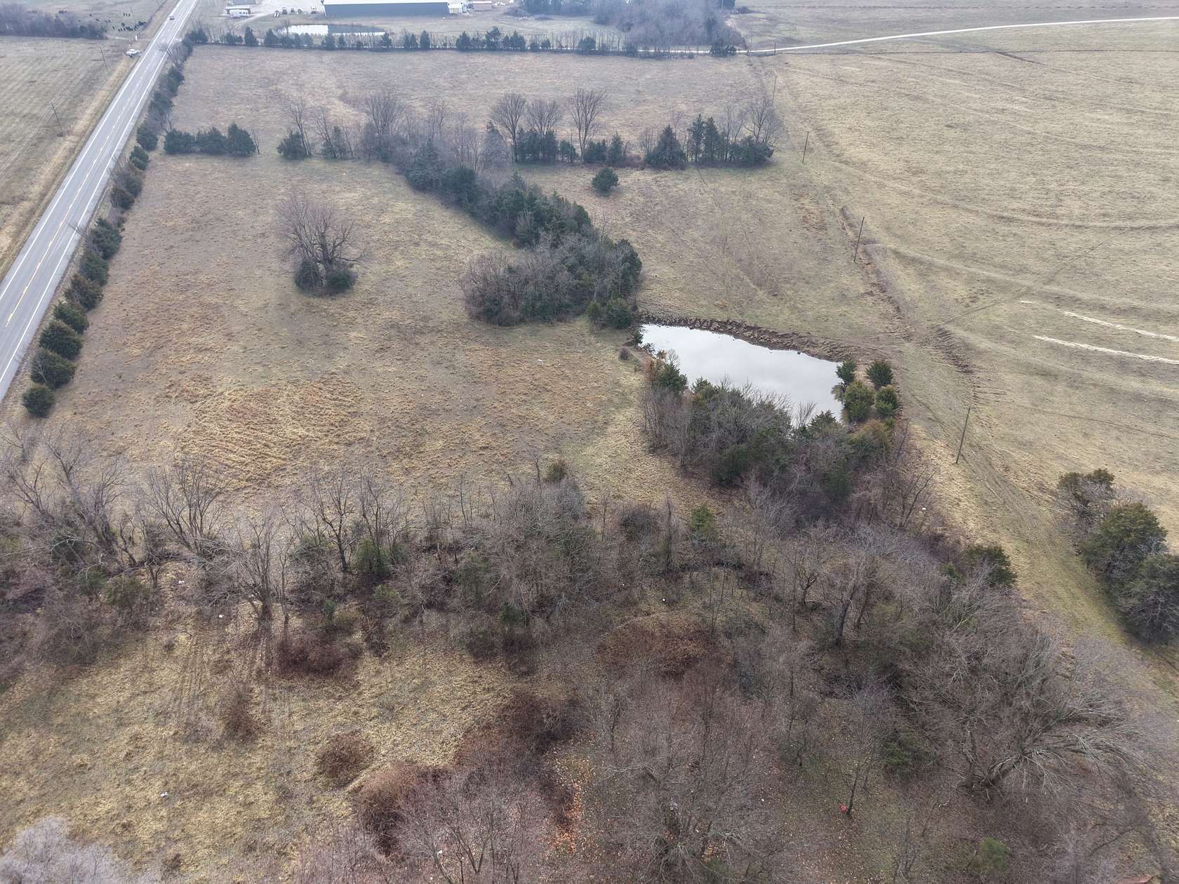 23.3 Acres of Land with Home for Sale in Louisburg, Missouri