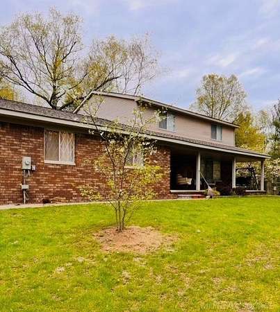 5 Acres of Residential Land with Home for Sale in Attica, Michigan