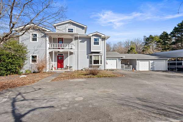 1.6 Acres of Residential Land with Home for Sale in Delano, Tennessee