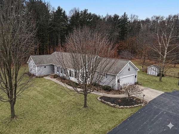 6 Acres of Land with Home for Sale in Hickory Corners, Michigan