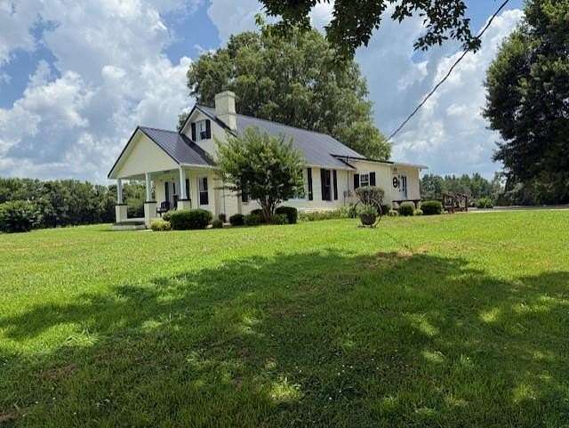 3.76 Acres of Land with Home for Sale in Cottage Grove, Tennessee