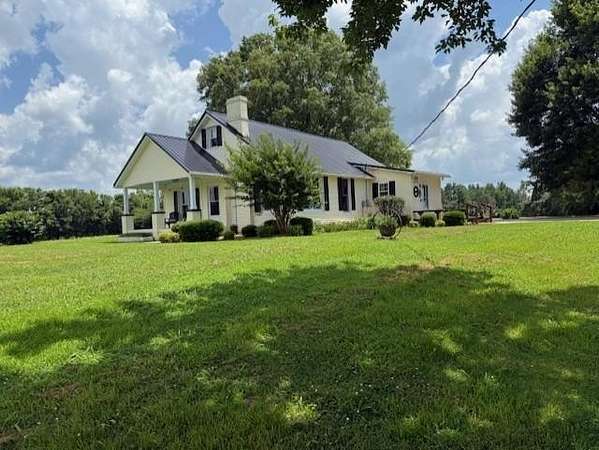 3.76 Acres of Land with Home for Sale in Cottage Grove, Tennessee