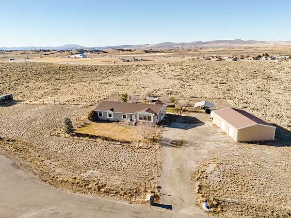 4.83 Acres of Residential Land with Home for Sale in Spring Creek, Nevada