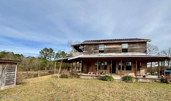 6.5 Acres of Residential Land with Home for Sale in Monticello, Mississippi