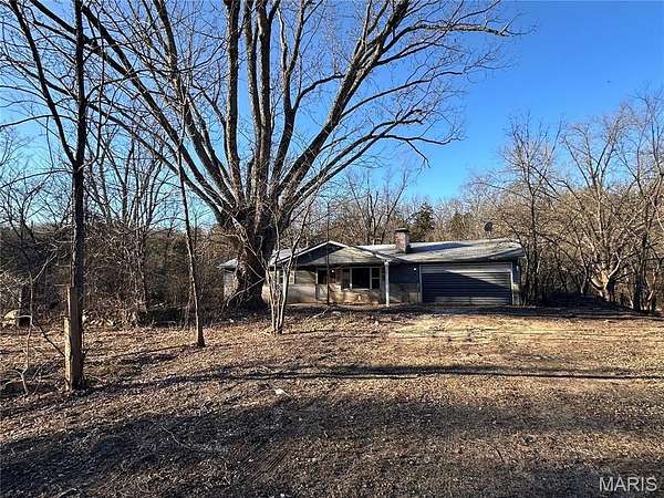 9.79 Acres of Residential Land with Home for Sale in Robertsville, Missouri