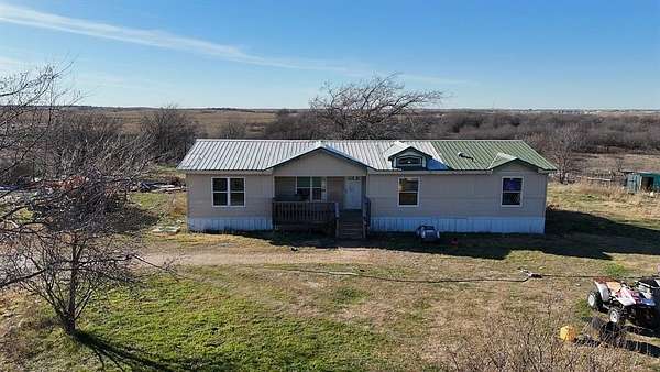 3 Acres of Land with Home for Sale in Rhome, Texas