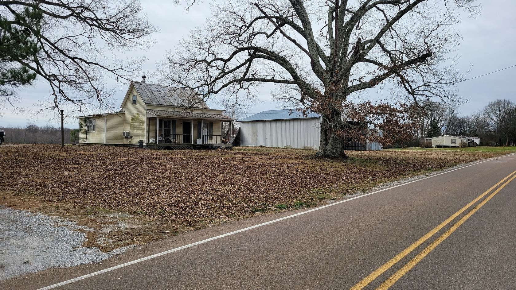 1.65 Acres of Residential Land with Home for Sale in Leoma, Tennessee