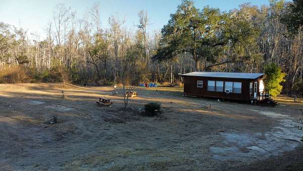 1.6 Acres of Land with Home for Sale in Mayo, Florida