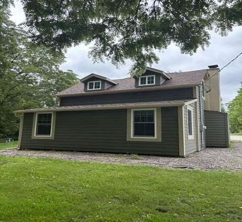 12.3 Acres of Land with Home for Sale in Menomonee Falls, Wisconsin
