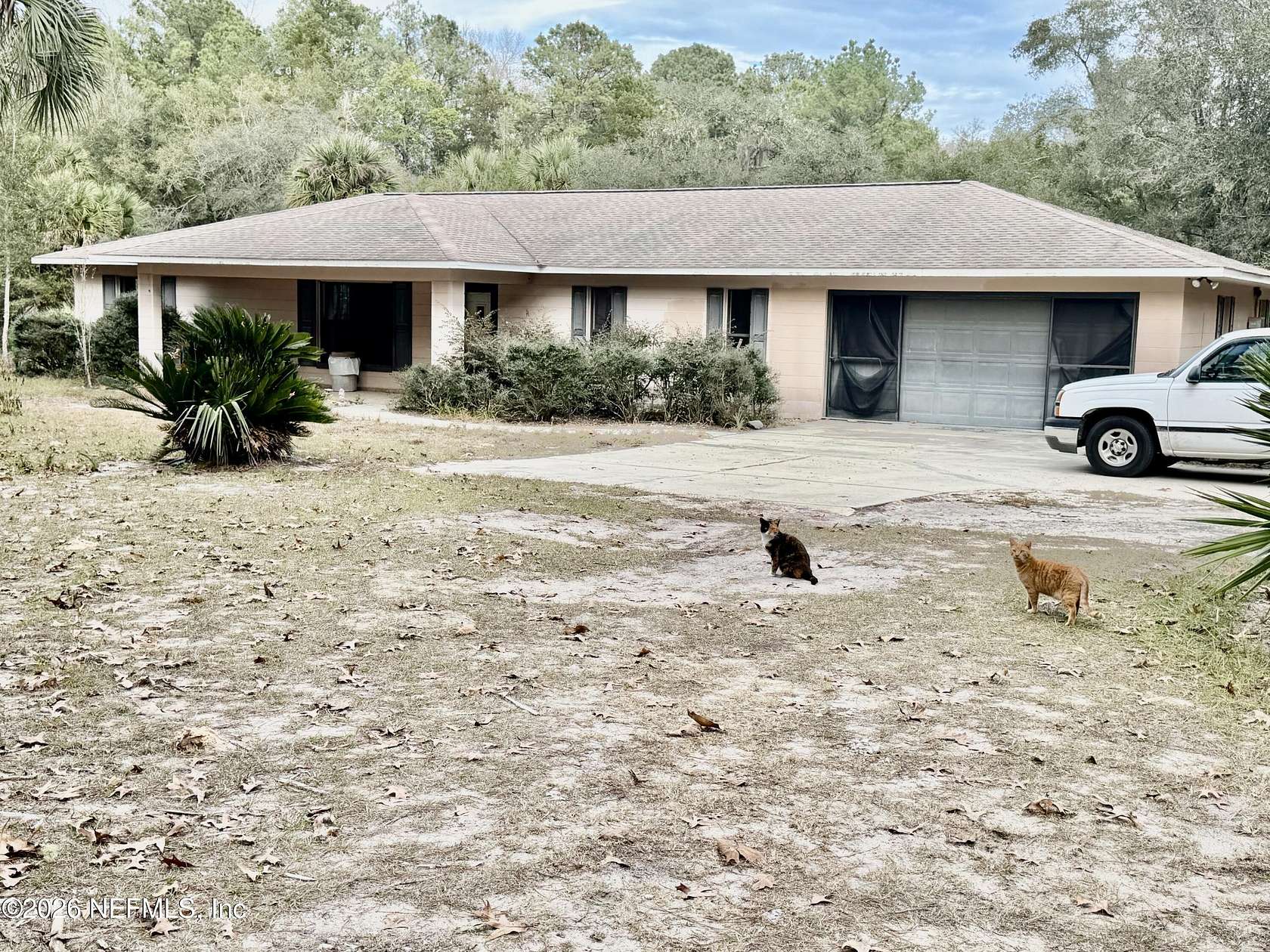 10 Acres of Residential Land with Home for Sale in Interlachen, Florida