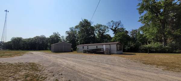 10 Acres of Improved Mixed-Use Land for Sale in White Cloud, Michigan