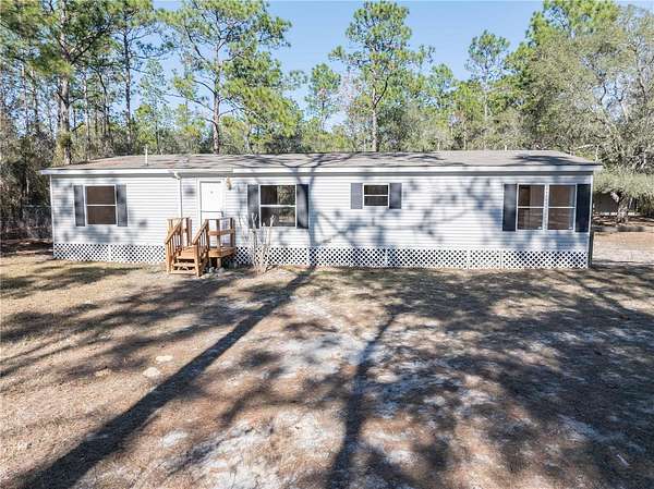 1.5 Acres of Residential Land with Home for Sale in Ocala, Florida